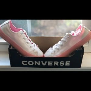 Pink and white Converse